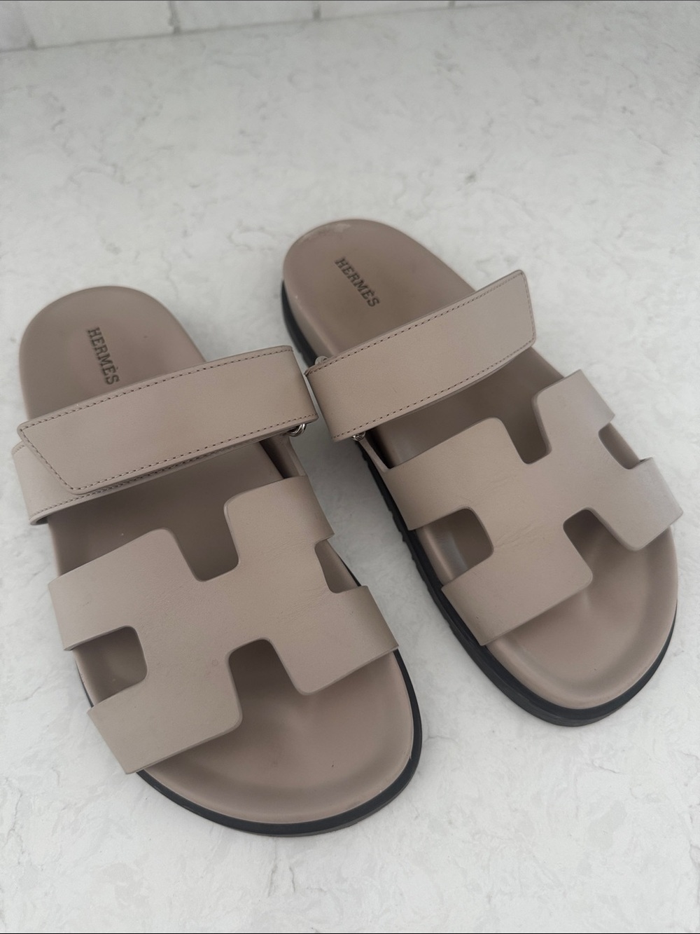 Hermes taupe leather Chypre slide sandals with black sole